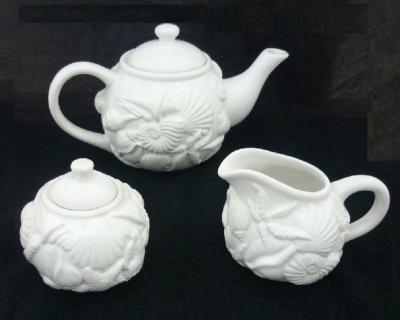 China OEM China Ceramic White Dolomite Fruit Embossed Children's Tea Set for sale