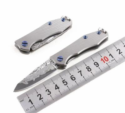 China VG10 Damascus Main Chain Titanium Handle Durable Damascus Steel Folding Tactical Knife for sale