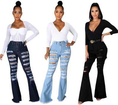 China Breathable Women Distressed Wide Leg Jeans High Waist Stretch Denim Pants Ripped Blue Flare Jeans for sale