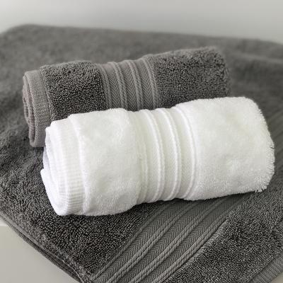 China Sustainable Factory Wholesale 5 Star Hotel Towels Hand Towel Gray And White 100% Cotton for sale