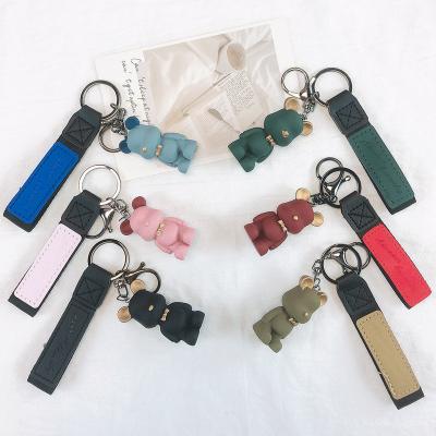 China Morden Bow Tie Luxury Nordic Bear Creative Bag Key Chain Pendant Car Couple Cute Bear Leather Key Chains for sale