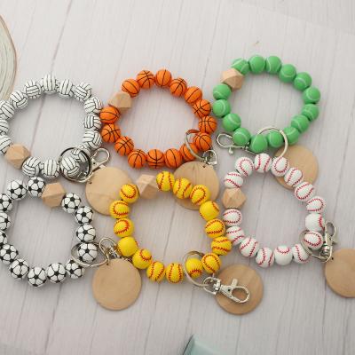 China 2022 hot new wooden baseball key chain printing volleyball beaded bracelet soccer basketball bracelet sports key chain for sale