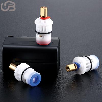 China Modern 20mm Copper Valve Core Faucet Repair Parts Water Valve Ceramic Cartridge Hot And Cold Water Quick Opening Valve Core for sale