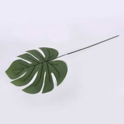 China Eco-Friendly Tropical Artificial Leaf Fabric Tropical Green Faux Palm Leaf Leaves Plant For Party Decoration for sale