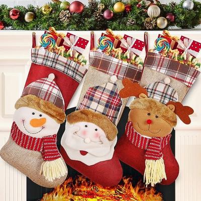 China Christmas Party Decoration Christmas Stockings Big Xmas Stockings Decoration 3D Plush Socks Gift Bags for Kids for sale