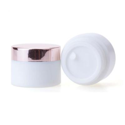 China New Arrival OEM Design Cosmetic White Glass Jar Opal Cream Container In Cosmetic Jars With Rose Gold Lid for sale