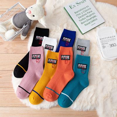 China Breathable Neutral Socks Style Sports Letter Striped Men's And Women's Socks for sale