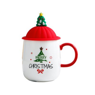 China Christmas Sustainable Gifts Santa Mugs with Silicone Cover and Spoon for sale