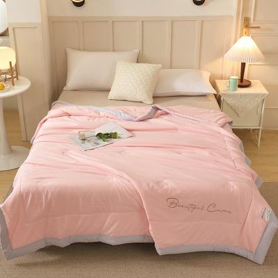 China Sustainable Bedding Luxury Light Embroidery Quality Summer Solid Prewashed Comforter For Bedroom for sale