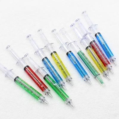 China Pen 4 Colors Roller Tip Creative Office Writing Pen Syringe Shape Promotional Pens for sale