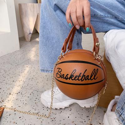 China Bolsa de dama 2021 high quality fashion hand letter special shoulder chains design female cross mini - circular body bags basketball shape purse for sale