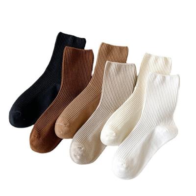 China New Women's QUICK DRY Medium Tube Socks Solid Color Double Needle Cotton Soft Socks for sale