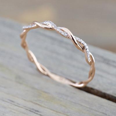 China FASHIONABLE Thin Twist Rose Gold Color Mini Finger Ring Micro Crystal Full Pave String Placing Cute Nobility Jewelry for sale