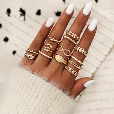 China FASHION Gypsy Rings Serpentine Demon Eye Star Geometry Gold Color Alloy Ring Set Personality Lady Wedding Chain Jewelry for sale