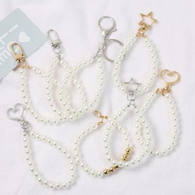 China FASHIONABLE Cute Luxury Keychain Women KeyChains Car Locks Bag Key Chains Decor Beads Tassel Rope Pending Charm For Airpods Case Gifts for sale