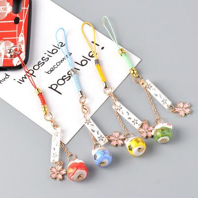 China Polyester Cute Maneki Neko Phone Strap Lanyards Decor Sakura Cat Bell Mobile Keycha for sale