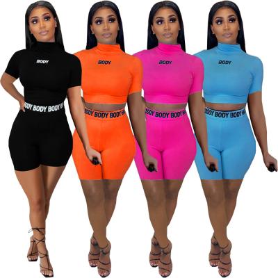 China 2021 Breathable Stylish Letter Printing Women's Sets Sportwear Short Sleeve Shorts Tight Fit Short Two Piece Set for sale