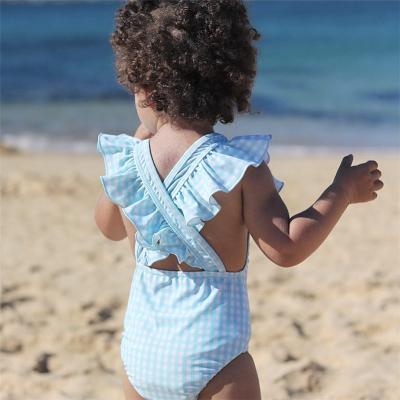 China Breathable Ruffle Tie Up Children Swimsuit Girls Swimwear Cute One Piece Kid Swimsuit for sale