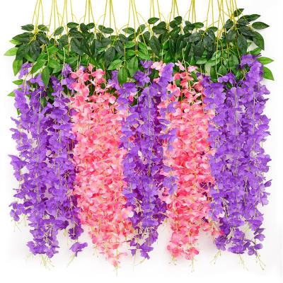 China Low MOQ Artificial Silk Flower Vine 110cm Ratta Wisteria Hanging Garland Silk Long Hanging Bush Artificial Flowers for sale