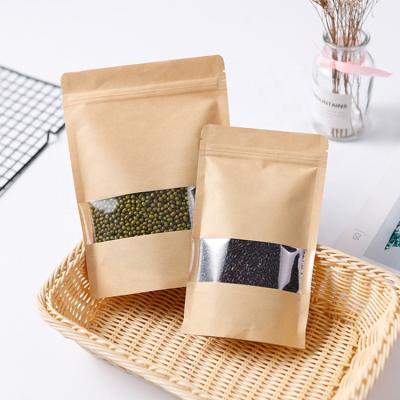 China Recyclable Top Quality Nuts Packaging Stand Up Kraft Paper Zipper Bags With A Clear Window for sale