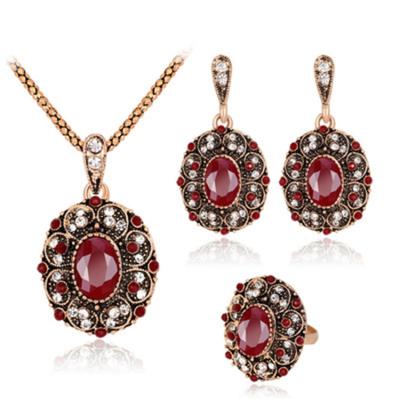 China YiXin Elegant Jewelry Necklace Set Antique Gold Plated Red Necklace Earrings Ring Three Piece Set for sale