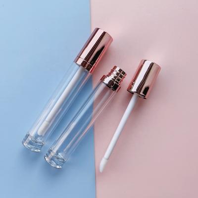 China JIE MEI Stock Best Selling Metallic Rose Gold Round Empty 6ML Lip Gloss Cosmetic Tube Container Lip Gloss Plastic Bottle With Ring for sale