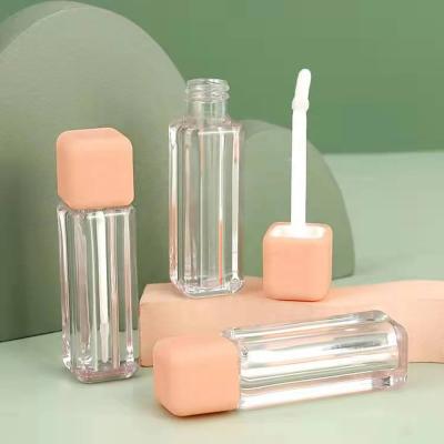 China Wholesale JIE MEI Stock MOQ 100PCS 2.5ML Soft Touch Rose Cap Cosmetic Empty Liquid Lipstick Tube Makeup Lip Gloss Bottle No Logo for sale