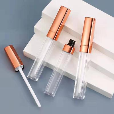 China Wholesale JIE MEI Stock Metallic Rose Gold Square Lip Gloss Bottle 6ML Long Lip Gloss Cosmetic Slim Empty Tube With Flat Brush for sale