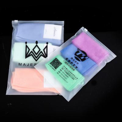 China Waterproof Custom Frosted Zipper Bags PVC Zip Lock Plastic Clothing Packaging Bags With Logos for sale