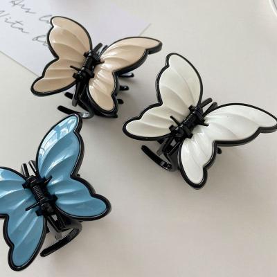 China CLARMER Daily Wear Cheap Fashion Women Fashion Butterfly Hair Accessories Plastic Wholesale Spring Hair Claw for sale