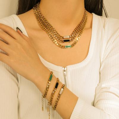 China Trendy Retro 18k Gold Plated Stainless Steel Cuban Link Necklace Chain Bracelet With Peacock Green Stone for sale