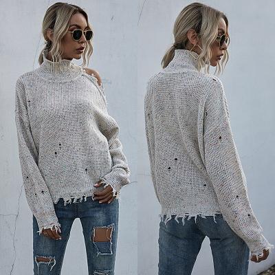 China Anti-pilling anti-pilling sweater 2021 off the shoulder long sleeve turtle neck loose solid color knit ripped distressed sweater women for sale