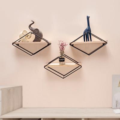 China Creative Nordic Multifunctional Wall Shelf Wall Shelf Living Room Bedroom Shelf Europe Wall Storage Rack for sale