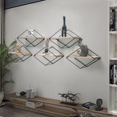 China Nordic Living Room Wall Rack Europe Wall Wrought Iron Rack Wall Hanging Display Storage Multifunctional Decorative Rack for sale