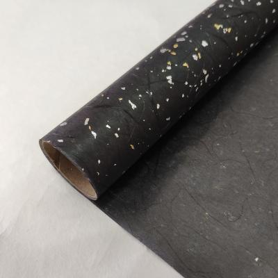 China Waterproof Black BOPP Laminated Glossy Metallic Foils Embedded Waterproof Flower Kraft Paper 60cm x 5m for sale