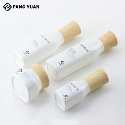 China China Supplier Wooden Square Lid Cosmetic Lotion Serum Grain Lid Pump Spray Bottle Glass Packaging Jars for sale