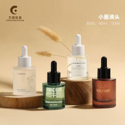 China New Design 30ml 40ml Cosmetic Wholesale Clear Dropper Bottle Serum Essential Oil Glass Bottles For Cosmetic Skin Care for sale