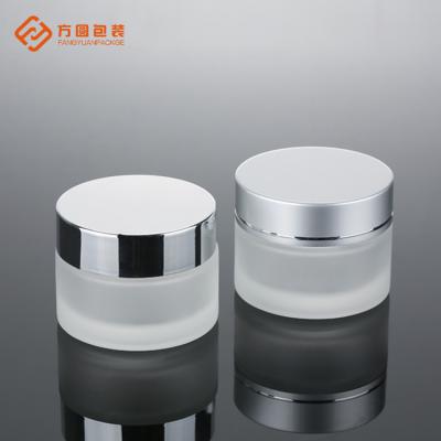 China Custom Color Cosmetic Round Shaped Cream Jar 5g 10g 20g 30g 50g Small Clear Frosted Glass Jars For Skin Care for sale