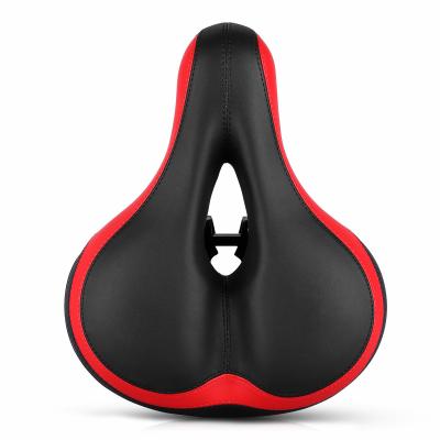 China Comfortable Soft Breathable Soft Hollow Bike Seat Cushion Large Size Reflective Shock Absorb Spring Bicycle Saddle for sale