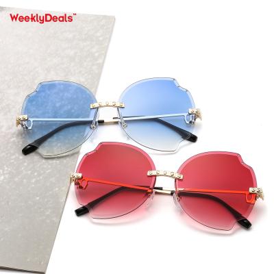 China 10 years experience luxury irregular rimless glasses 2020 cool fashion sunglasses for sale