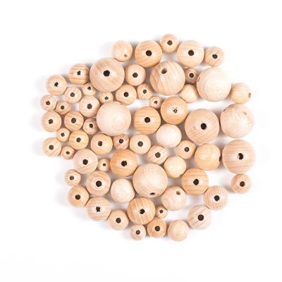 China Natural Unfinished Wood Mix Size 12Mm 14Mm 16Mm 18Mm 20Mm 25Mm Shapes Craft Beech Wood Round Decorative Wooden Beads In Bulk for sale