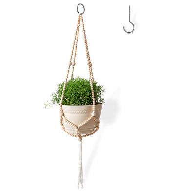 China 2021 New Minimalist Decoration Diy Home Indoor Minimalist Design Jute Macrame Plant Hanging Hanger Set Kit Cotton Rope With Wood Beads for sale