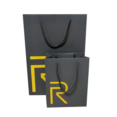 China Recycled Materials Customized Double Side Colors Print Boutique Gift Paper Bag Custom Print With Logo for sale