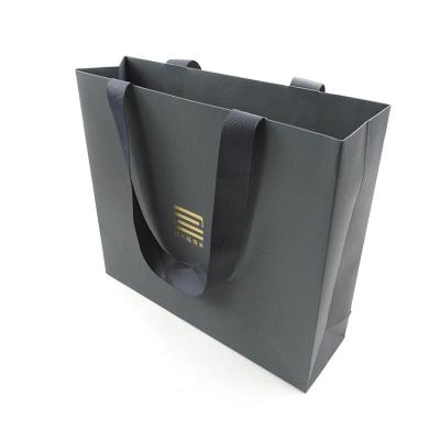 China Recycled Materials Customized Luxury Black Custom Paper Bag Logo Paper Bag With Ribbon Handle for sale