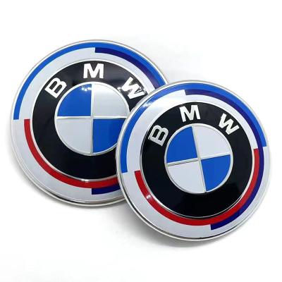 China Auto parts anniversary edition plastic common version modified car logo front and rear wheel hub cover steering wheel standard logo for sale