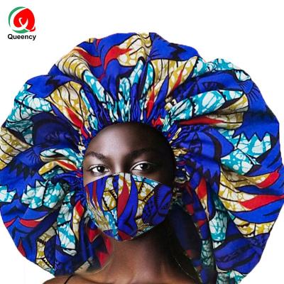 China Queency popular handmade African satin sleep bonnet matching Ankara MAS k fabric extra size sleep bonnet for sale