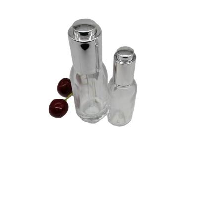 China 15ml30ml Push Button Essential Oil Cosmetic Bottle Customize Cosmetic Glass Dropper Bottle for sale