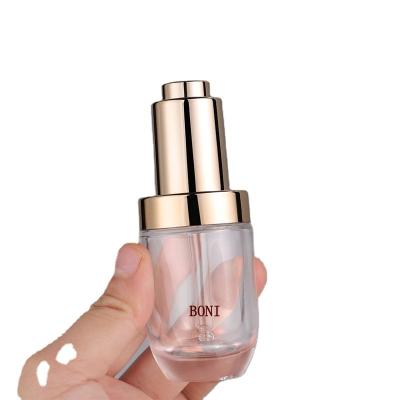 China Personal Care Essential Oil Serum Bottle 10ml 20ml 30ml 100ml Clear Glass Bottle Frosted Dropper Bottle With Gold Silver Lid for sale