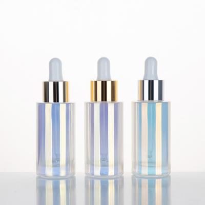 China Customizable Colorful Luxury Empty Personal Care Dropper Bottle 30ML Essential Oil Bottle With Dropper for sale