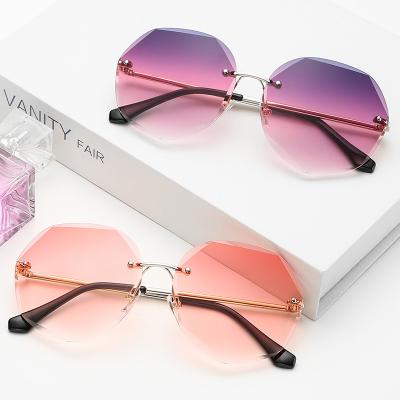 China Fashion Square Rimless Sunglasses Luxury Gradient Rimless Sun Glasses Shades Ladies Frameless Glasses for sale